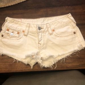 True religion cut-off jean shorts.